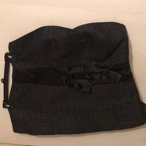 Black strapless top w/accents elastic in back